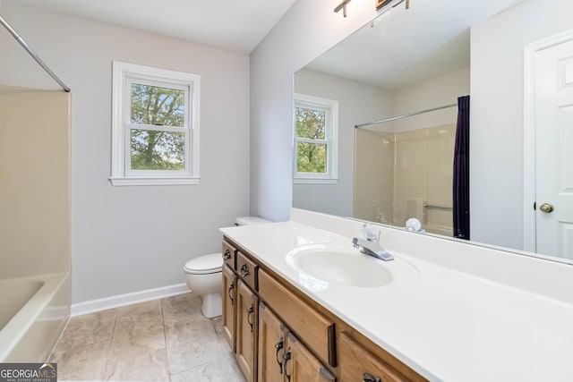 bathroom featuring toilet and vanity