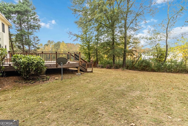 view of yard with a deck