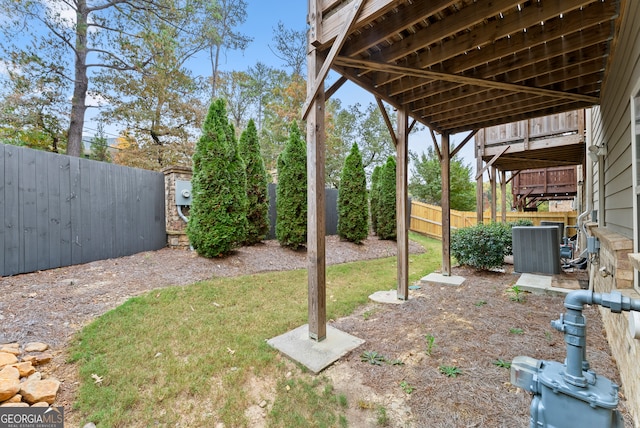 view of yard featuring central air condition unit