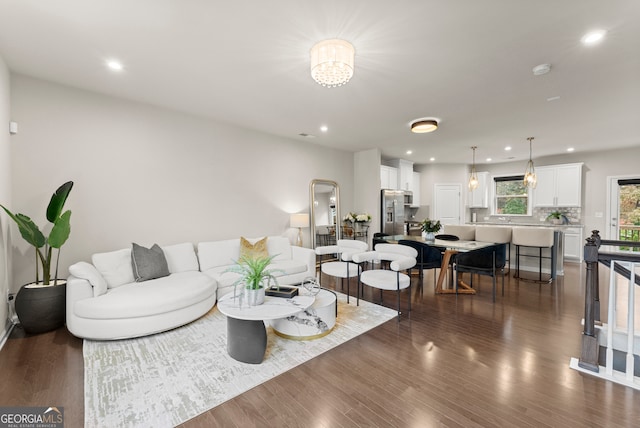 living room with dark wood-type flooring