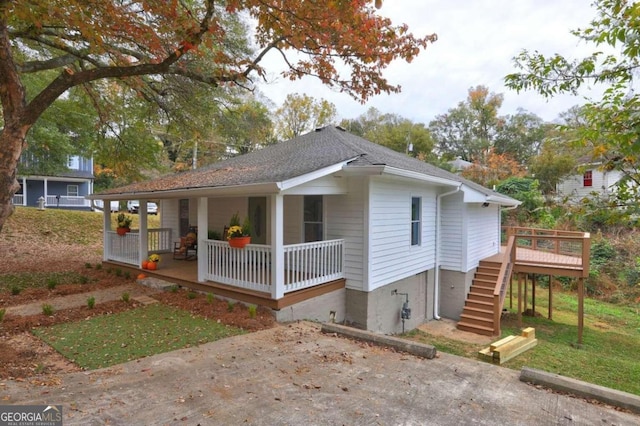 view of front of house with a deck