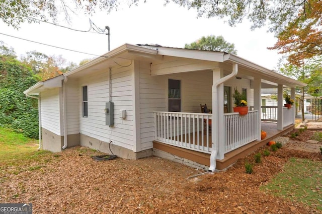 view of home's exterior with a porch