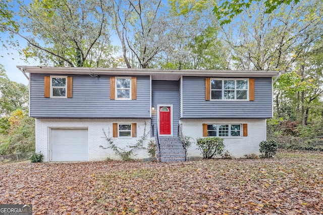 raised ranch with a garage