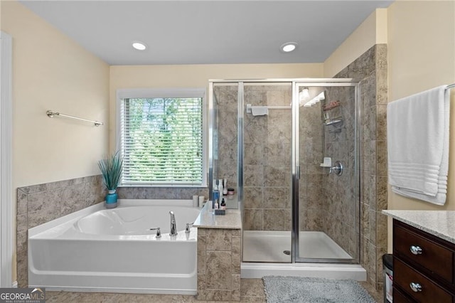 bathroom featuring tile patterned floors and plus walk in shower