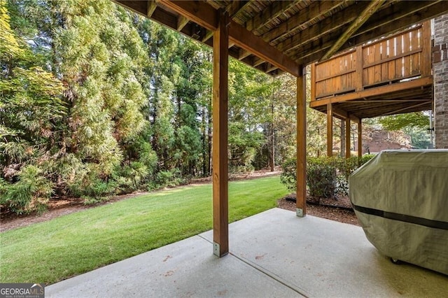 view of patio / terrace featuring grilling area and a deck