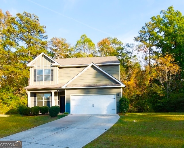 view of front of home with a garage and a front yard