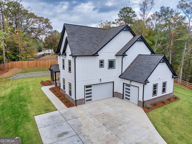 exterior space with a garage and a front yard