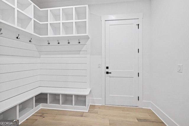 mudroom with hardwood / wood-style floors