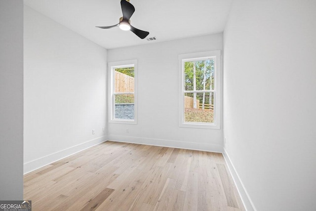 unfurnished room with light hardwood / wood-style floors and ceiling fan