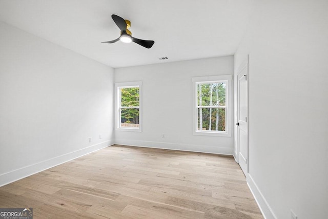 unfurnished room with light hardwood / wood-style floors and ceiling fan