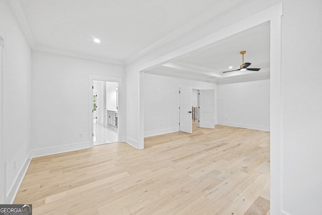 unfurnished living room with light wood-type flooring and ceiling fan