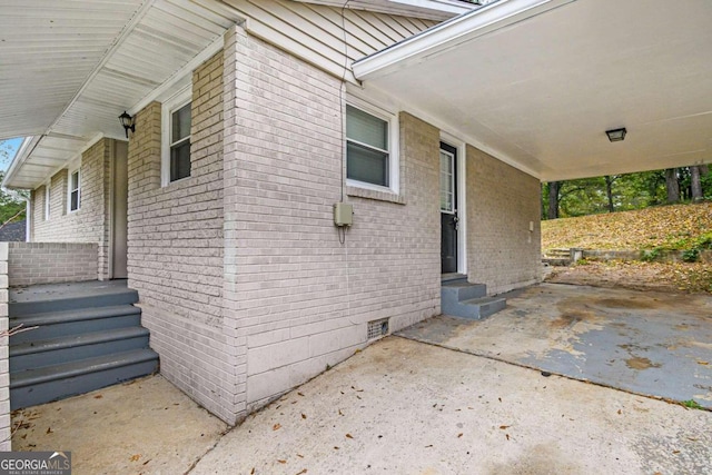 2910 Delowe Dr, Atlanta, GA 30344 - view of patio / terrace featuring a carport and entry steps