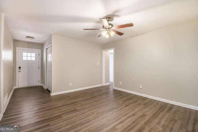 2910 Delowe Dr, Atlanta, GA 30344 - entrance foyer featuring a ceiling fan, dark wood-style floors, and baseboards