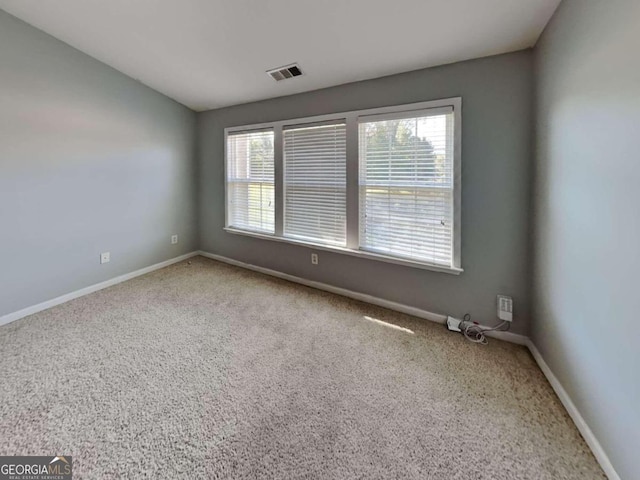 view of carpeted spare room