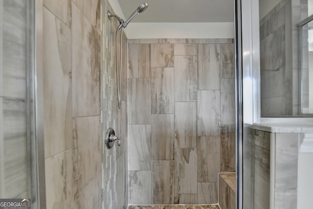 bathroom featuring tiled shower