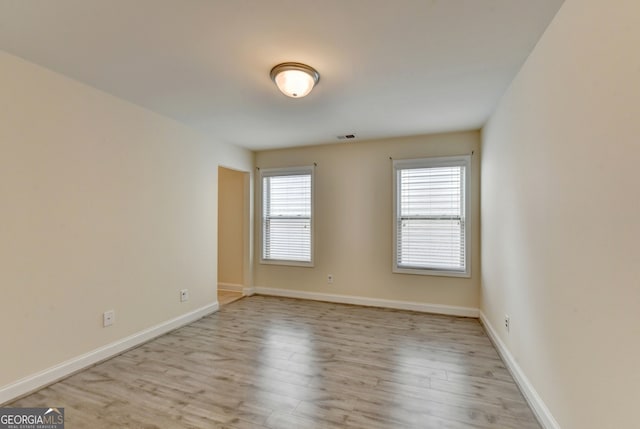 empty room featuring light hardwood / wood-style floors