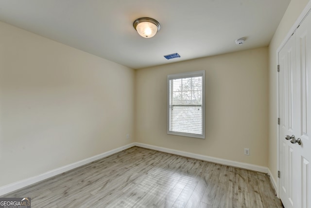 empty room featuring light hardwood / wood-style flooring