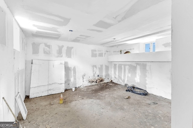 bathroom featuring concrete flooring