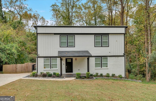 view of front of house with a front lawn