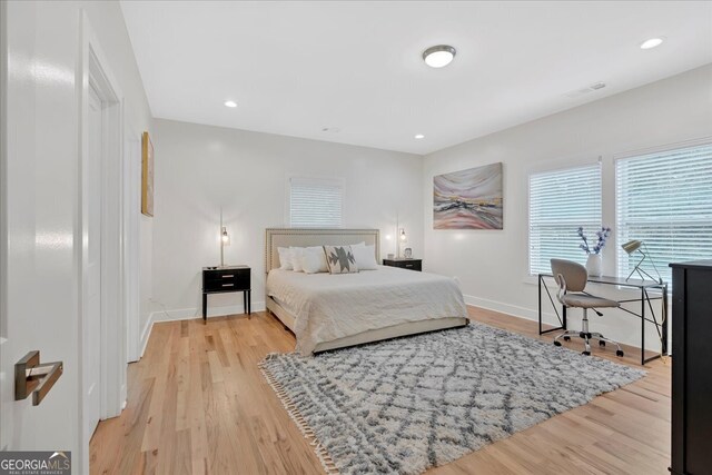 bedroom featuring light hardwood / wood-style floors