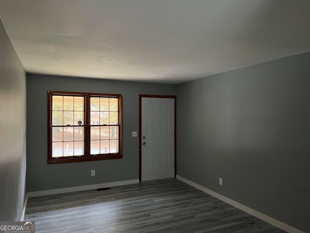 foyer featuring dark hardwood / wood-style floors