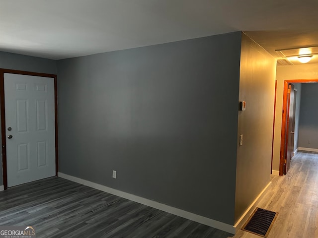 foyer entrance featuring hardwood / wood-style flooring