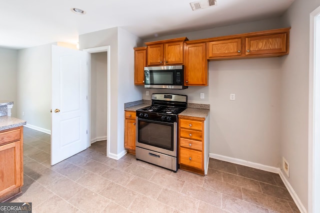 kitchen featuring appliances with stainless steel finishes