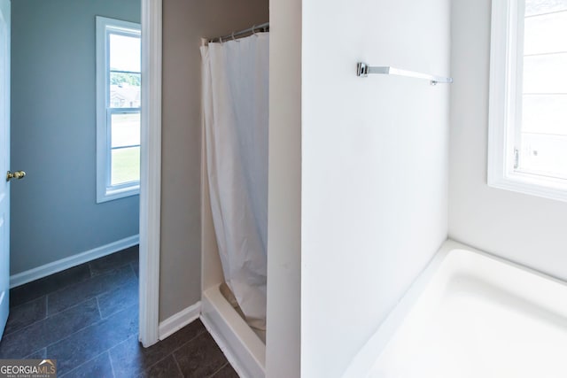 bathroom featuring walk in shower