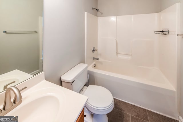 full bathroom featuring toilet, vanity, shower / bath combination, and tile patterned floors