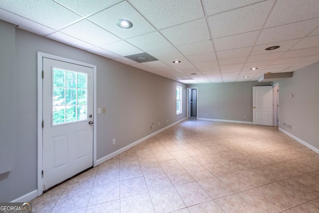 entryway featuring a paneled ceiling