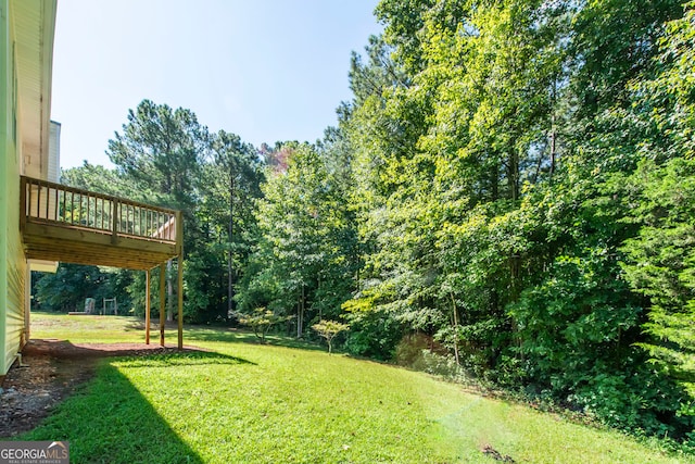 view of yard with a deck