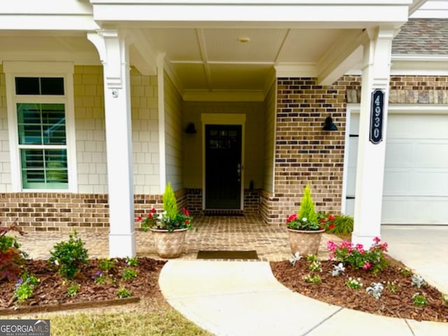 property entrance with a garage