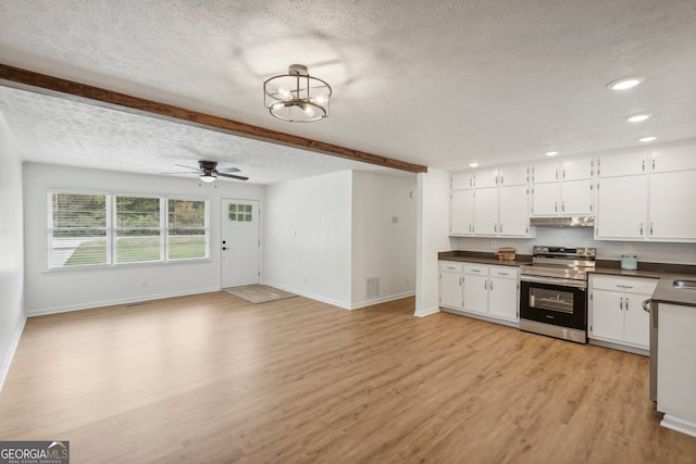 kitchen featuring white cabinetry, a textured ceiling, light hardwood / wood-style floors, and electric range