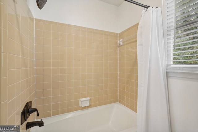 bathroom featuring shower / tub combo