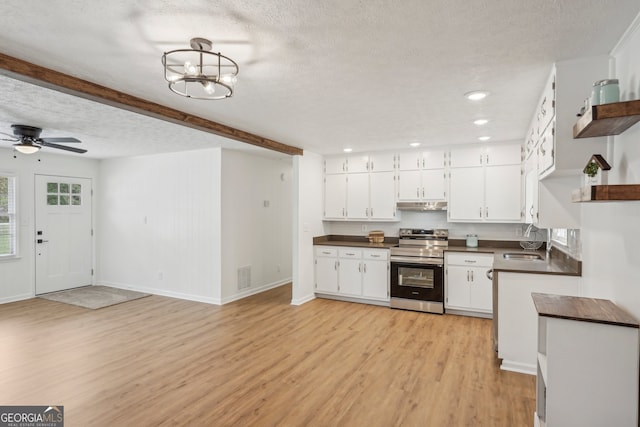 kitchen with light hardwood / wood-style floors, stainless steel electric range, white cabinetry, and a textured ceiling