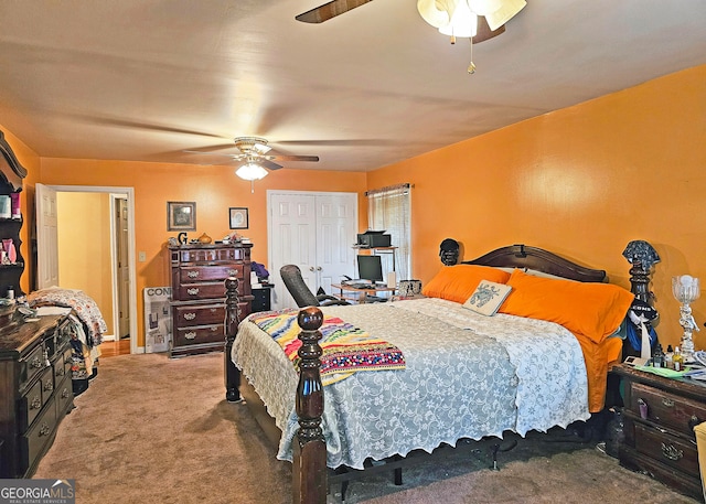 bedroom with ceiling fan, carpet flooring, and a closet