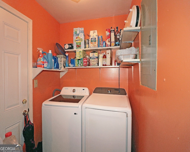 laundry room with independent washer and dryer