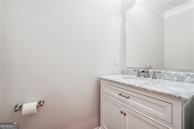 bathroom featuring vanity and crown molding