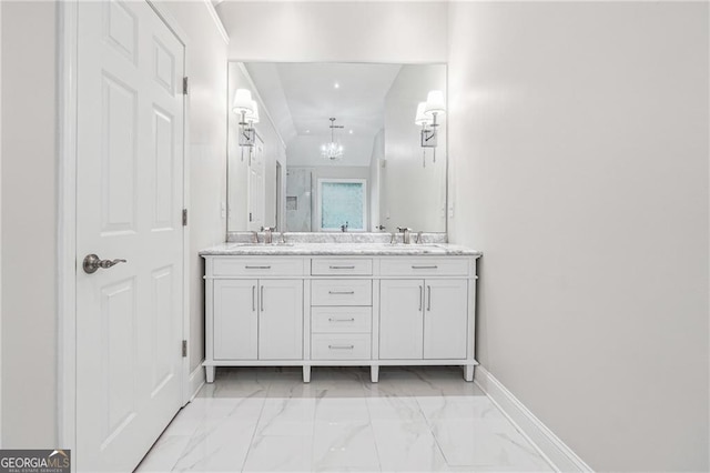 bathroom with a shower, vanity, and an inviting chandelier