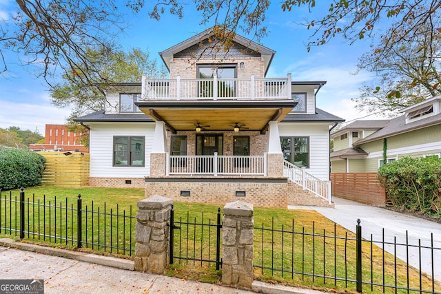 view of front facade featuring covered porch, a front lawn, and ceiling fan