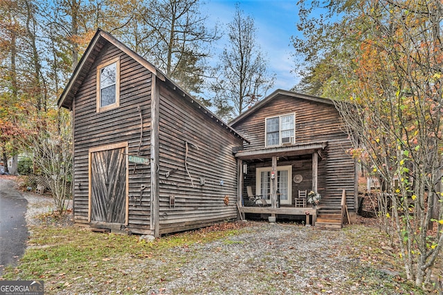 view of property with covered porch