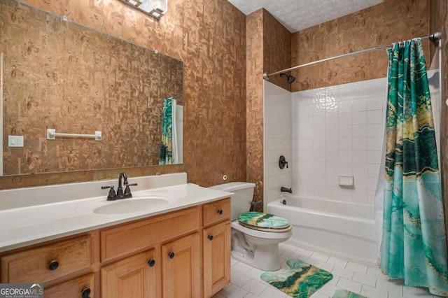 full bathroom with tile patterned floors, vanity, a textured ceiling, shower / tub combo, and toilet