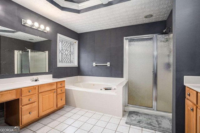 bathroom with vanity, tile patterned floors, and shower with separate bathtub