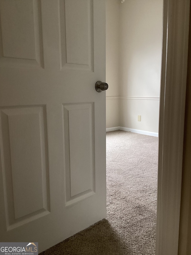 interior details featuring carpet floors