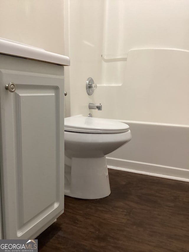 bathroom with hardwood / wood-style flooring