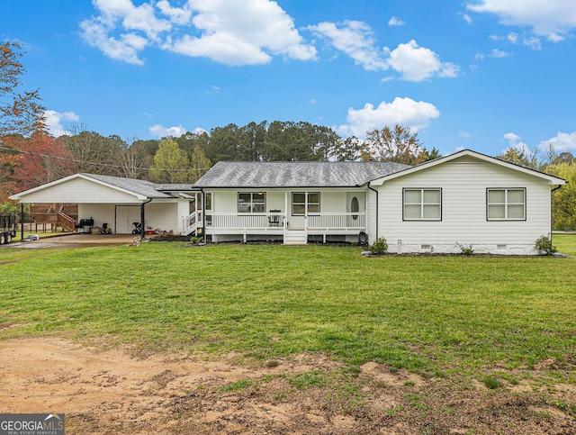 back of house featuring a porch, an attached carport, dirt driveway, crawl space, and a lawn