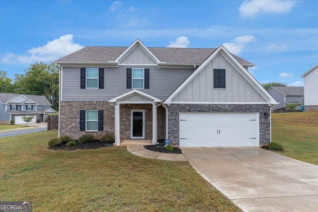 view of front of property featuring a front lawn and a garage