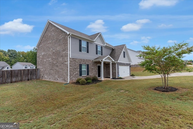 view of front of house featuring a front lawn and a garage