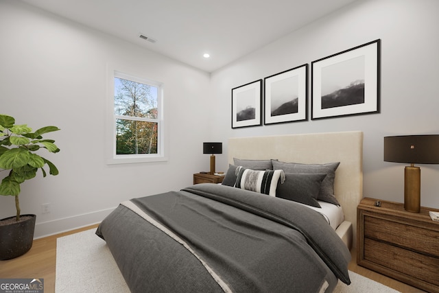 bedroom featuring light hardwood / wood-style flooring