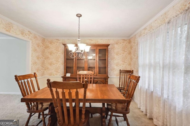 carpeted dining room with a notable chandelier and crown molding